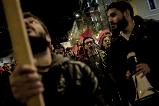 Акция в Афинах против визита Ангелы Меркель