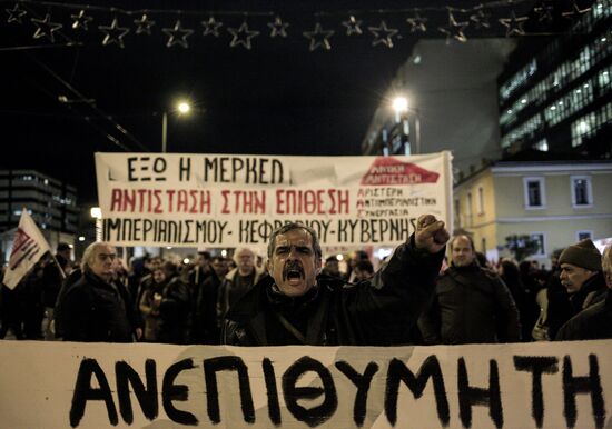 Акция в Афинах против визита Ангелы Меркель