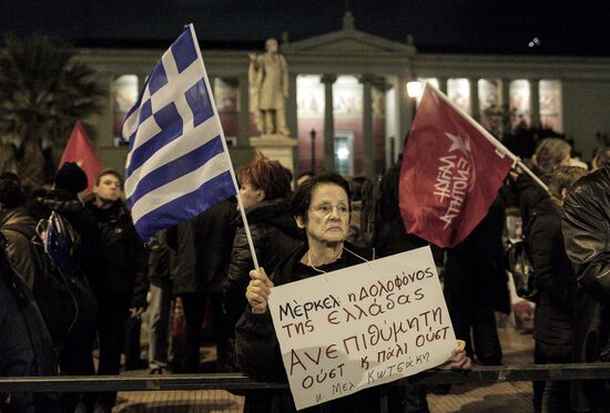 Акция в Афинах против визита Ангелы Меркель