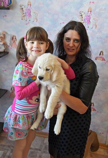 Девочке из Приморья подарили щенка после письма Путину