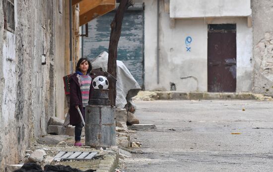 Жизнь в разрушенных районах сирийского Алеппо