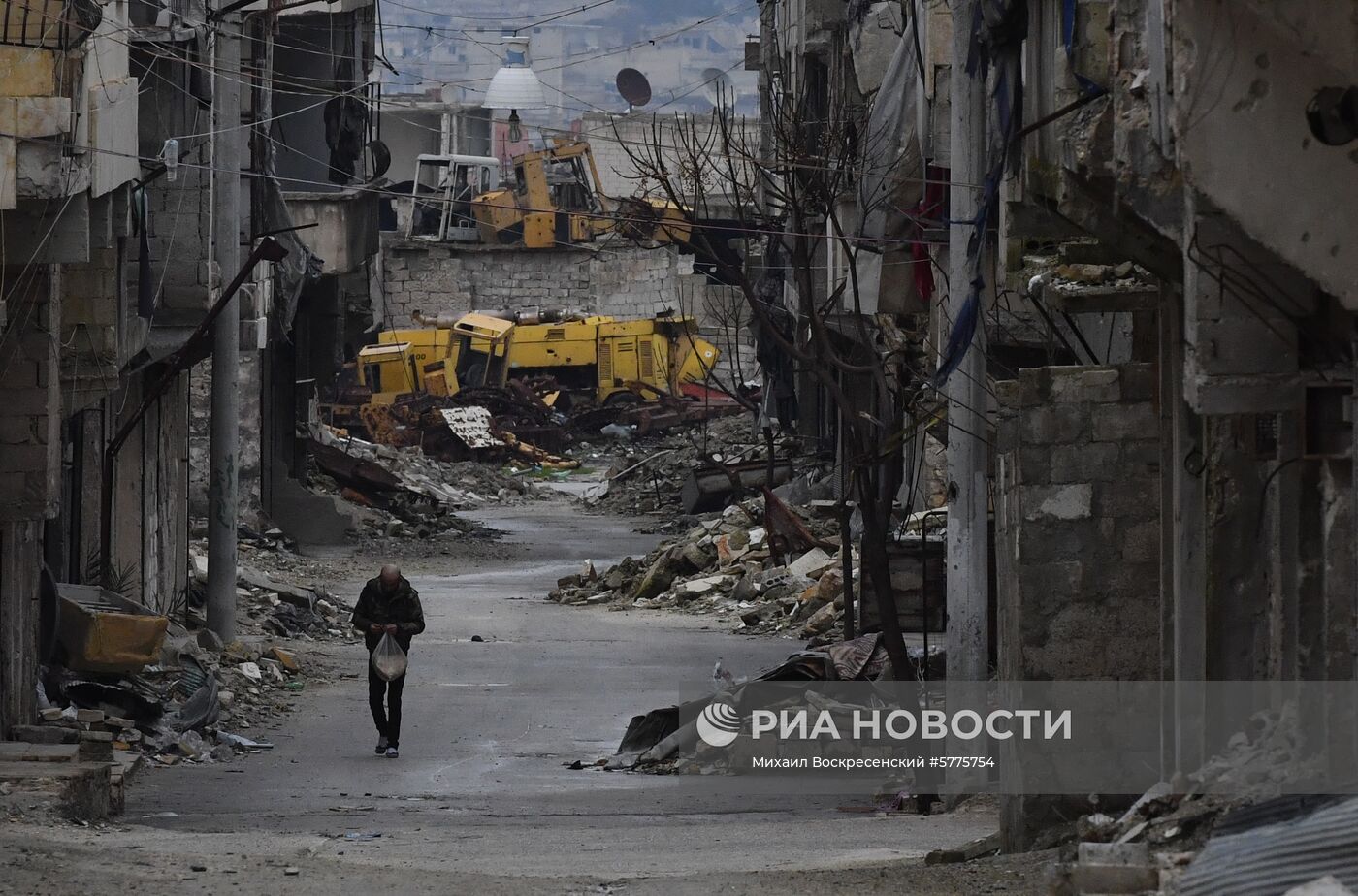 Жизнь в разрушенных районах сирийского Алеппо