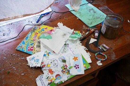 Последствия обстрела в Луганской области