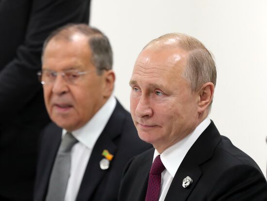 Рабочий визит президента РФ В. Путина в Японию для участия в саммите "Группы двадцати"