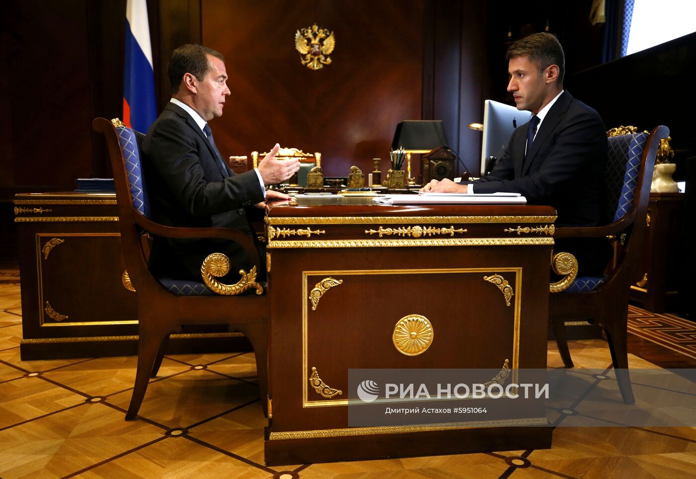 Премьер-министр РФ Д. Медведев встретился с генеральным директором "Дом.рф" А. Плутником