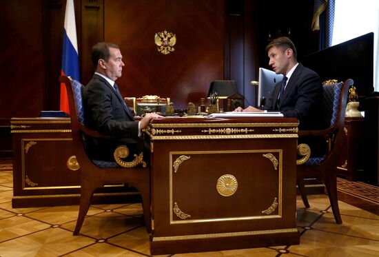Премьер-министр РФ Д. Медведев встретился с генеральным директором "Дом.рф" А. Плутником