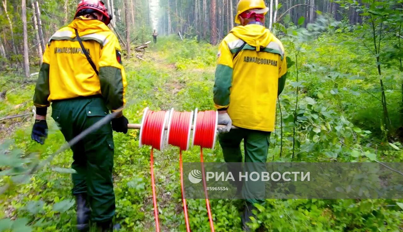Ликвидация лесных пожаров в Красноярском крае и Иркутской области