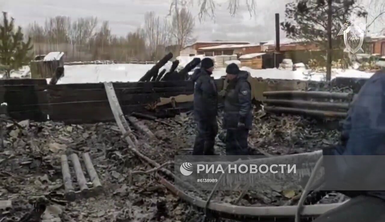 Следственные действия на месте пожара в Томской области