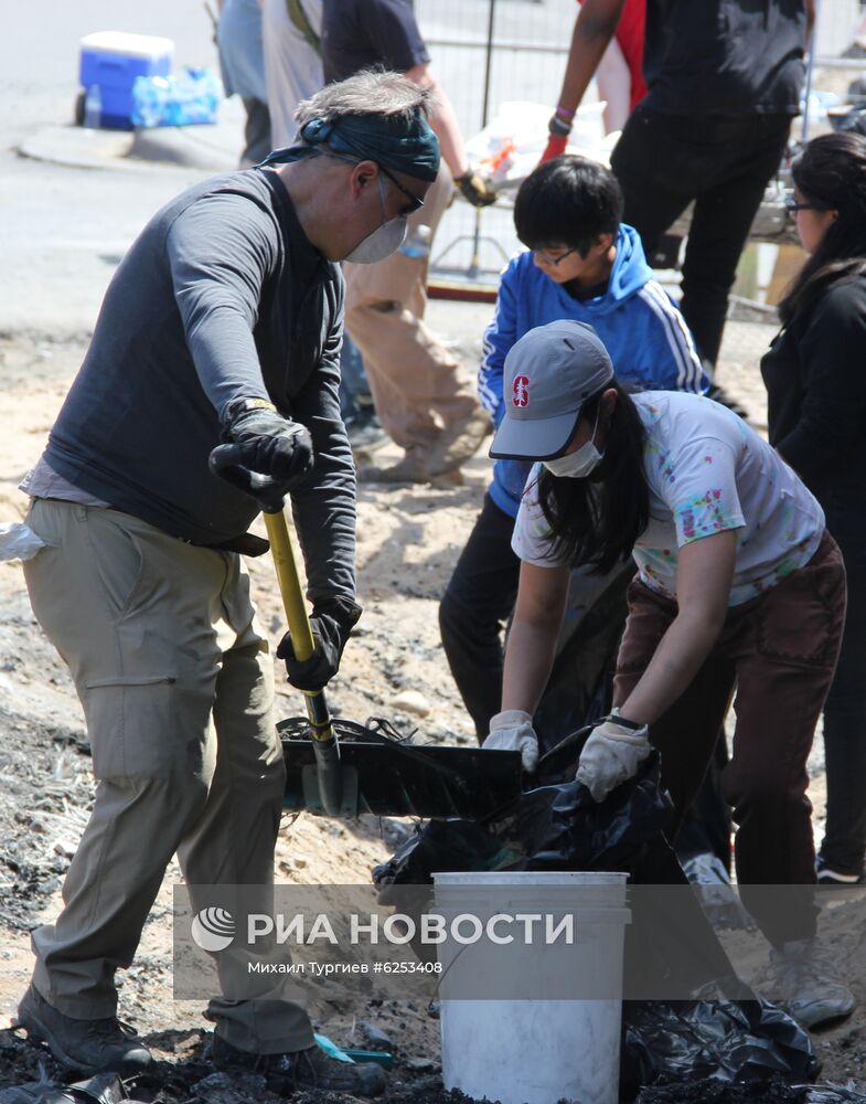 Жители Миннеаполиса ликвидируют последствия беспорядков