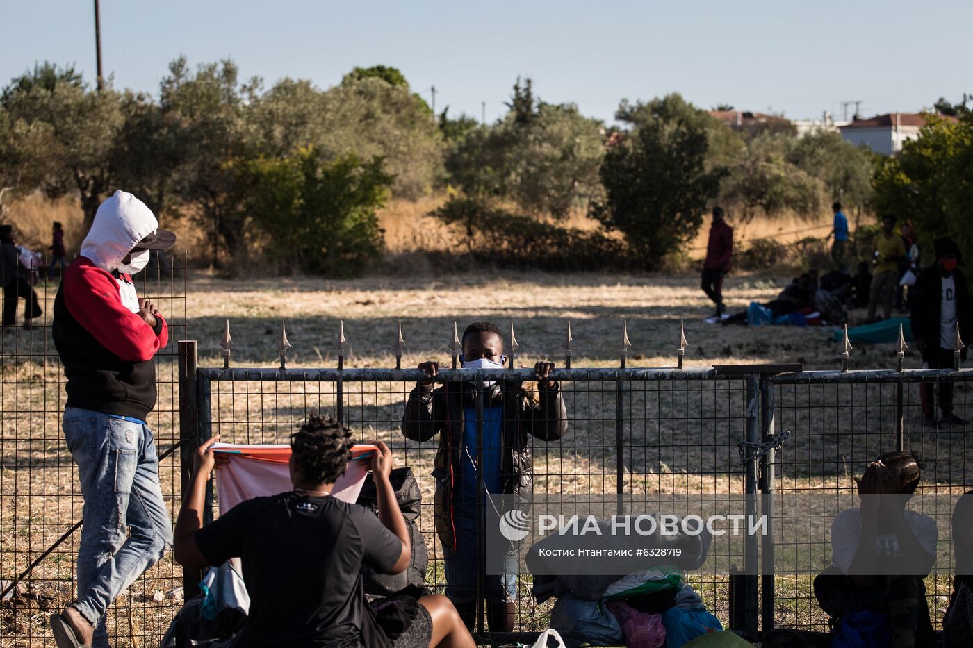 Последствия пожара в лагере мигрантов в Греции