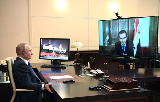 Президент РФ В. Путин провел встречу в режиме телемоста с президентом Сирии Башаром Асадом