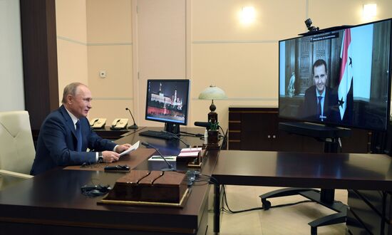 Президент РФ В. Путин провел встречу в режиме телемоста с президентом Сирии Башаром Асадом