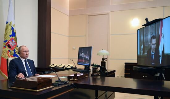 Президент РФ В. Путин провел встречу в режиме телемоста с президентом Сирии Башаром Асадом