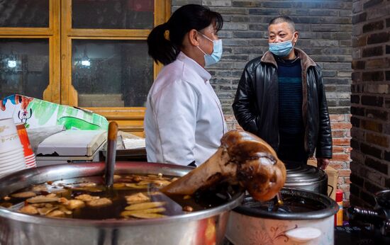 Китай через год после начала пандемии