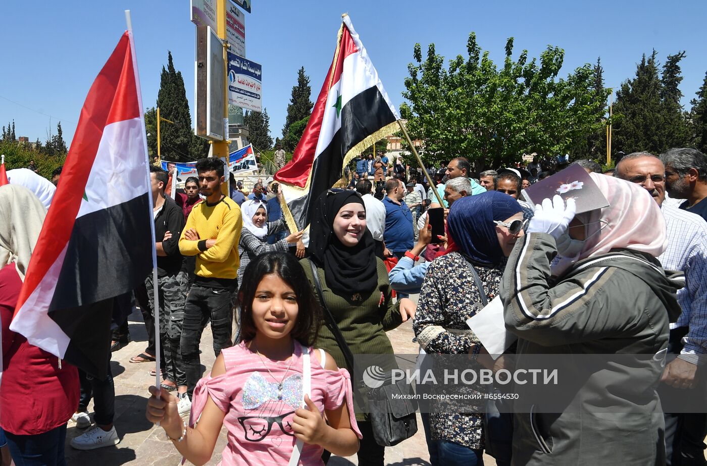 Митинг в поддержку президента Б. Асада в Сирии