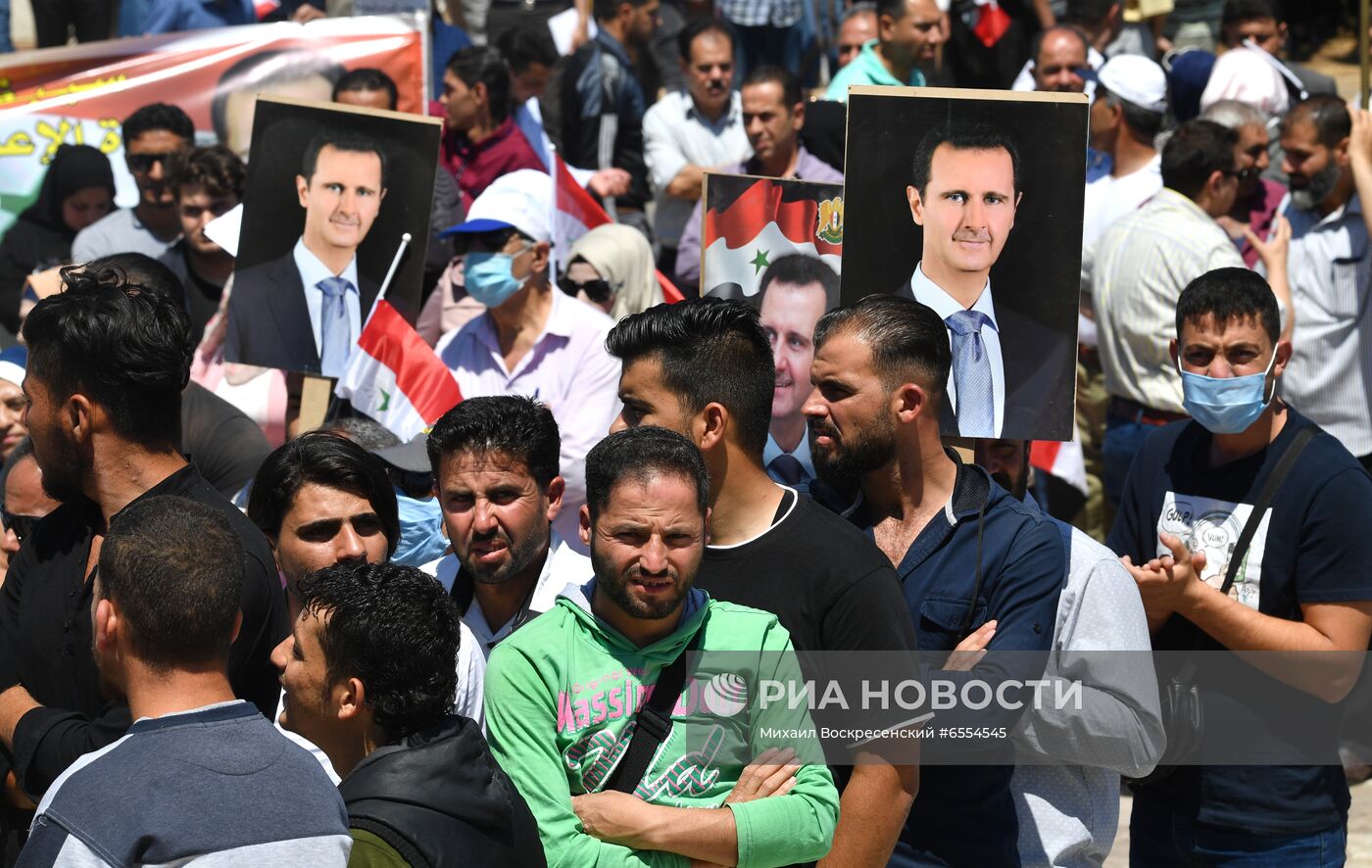 Митинг в поддержку президента Б. Асада в Сирии