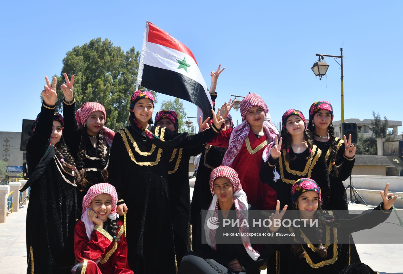 Митинг в поддержку президента Б. Асада в Сирии