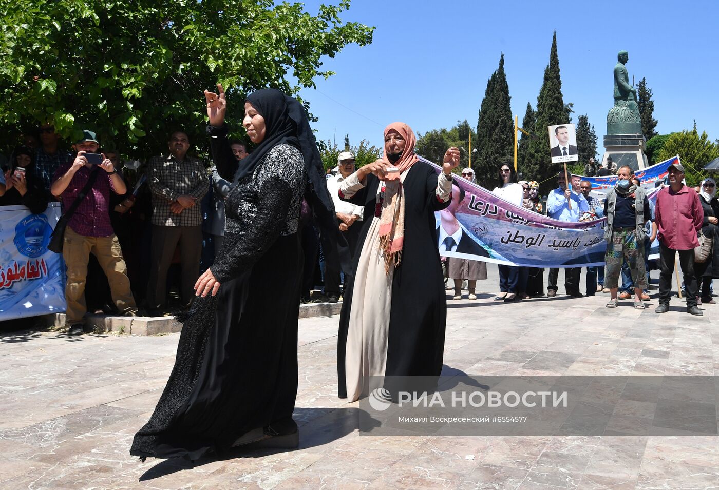 Митинг в поддержку президента Б. Асада в Сирии