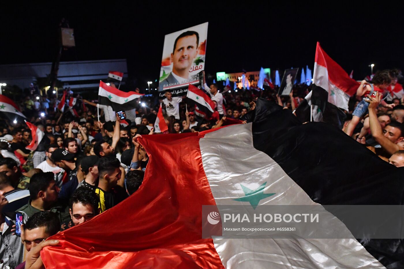 Празднование победы Б. Асада на президентских выборах в Сирии