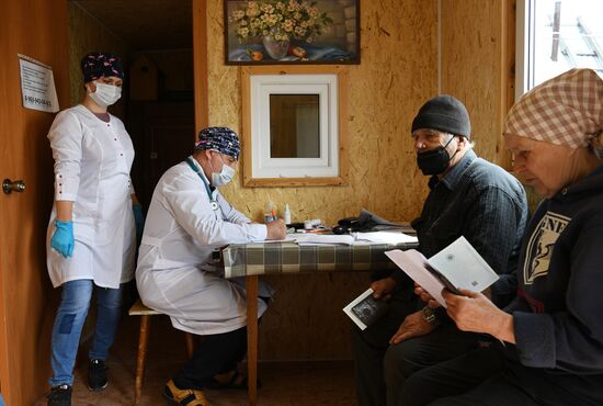 Работа мобильной бригады по вакцинации дачников от COVID-19  