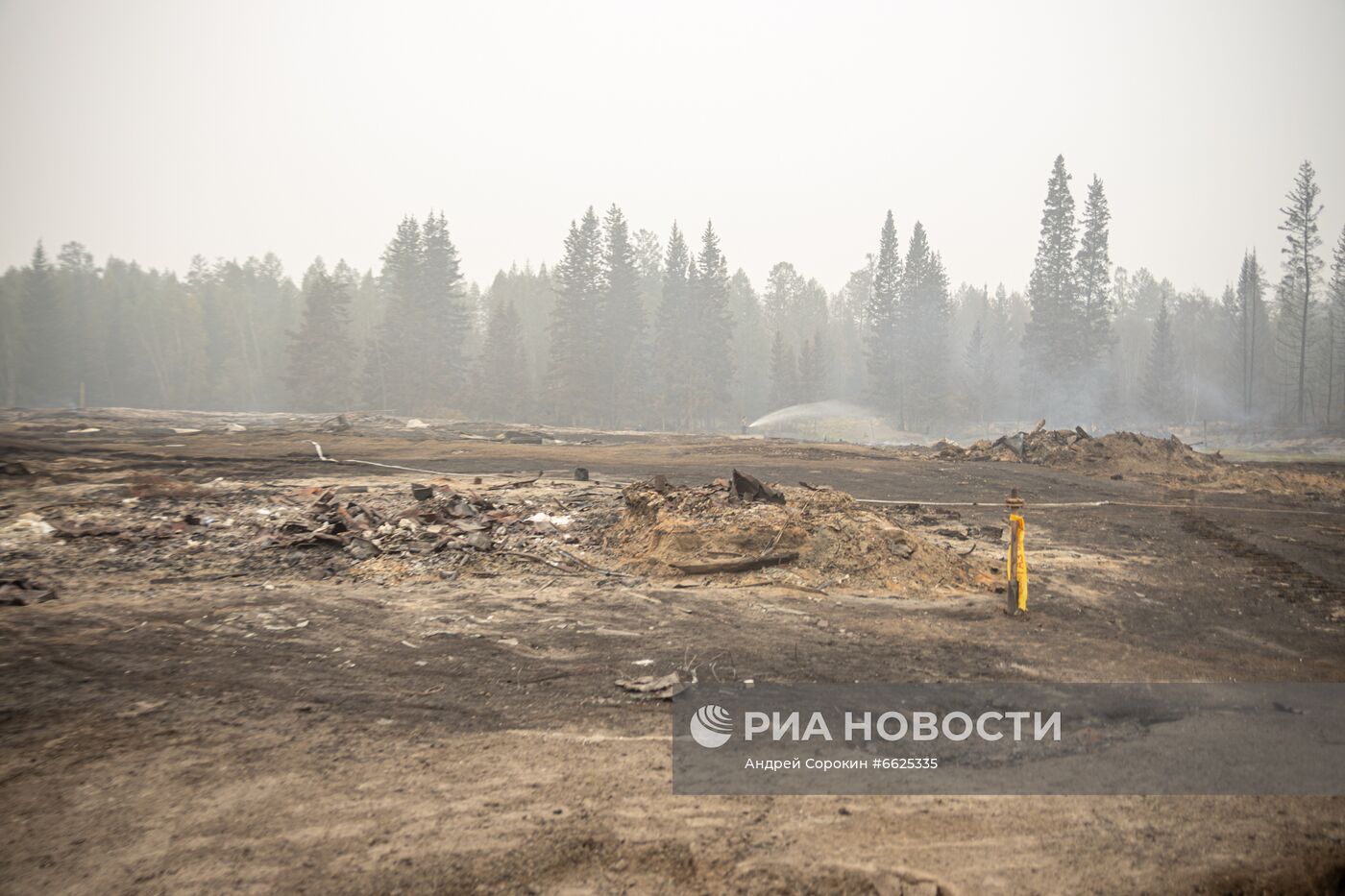 Ю. Трутнев посетил пострадавшее от пожаров село Бясь-Кюель в Якутии