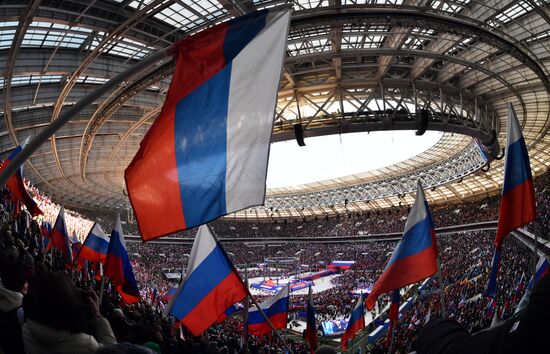 Участники митинга-концерта в "Лужниках", посвященного воссоединению Крыма с Россией. Место: Россия, Москва. Автор: Евгений Биятов/РИА Новости. Митинг-концерт, посвященный воссоединению Крыма с Россией