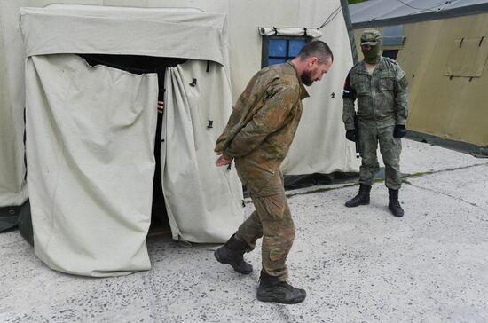 Пункт временного содержания украинских военнопленных на Харьковском направлении