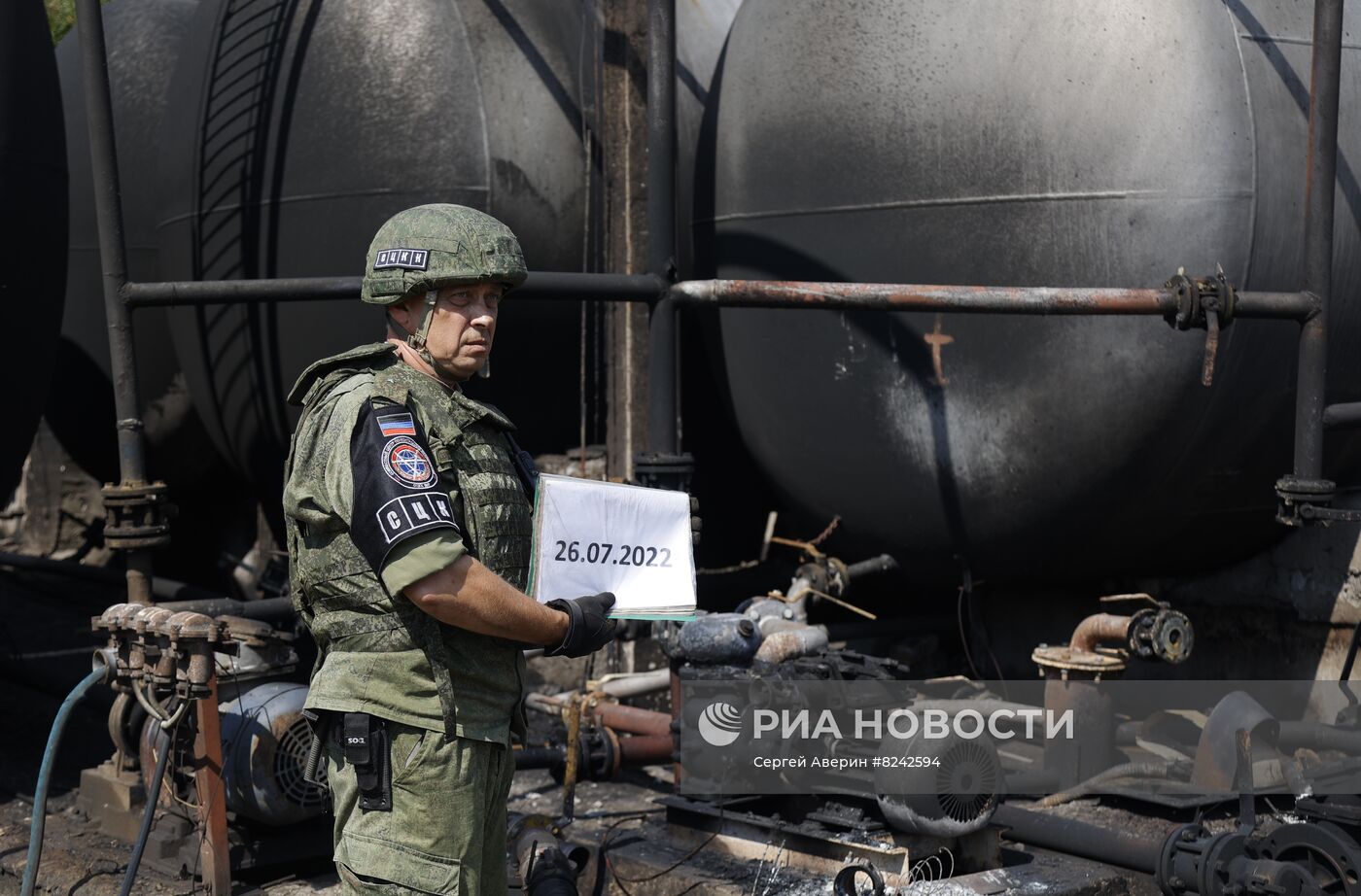 Последствия пожара на нефтебазе в Донецке