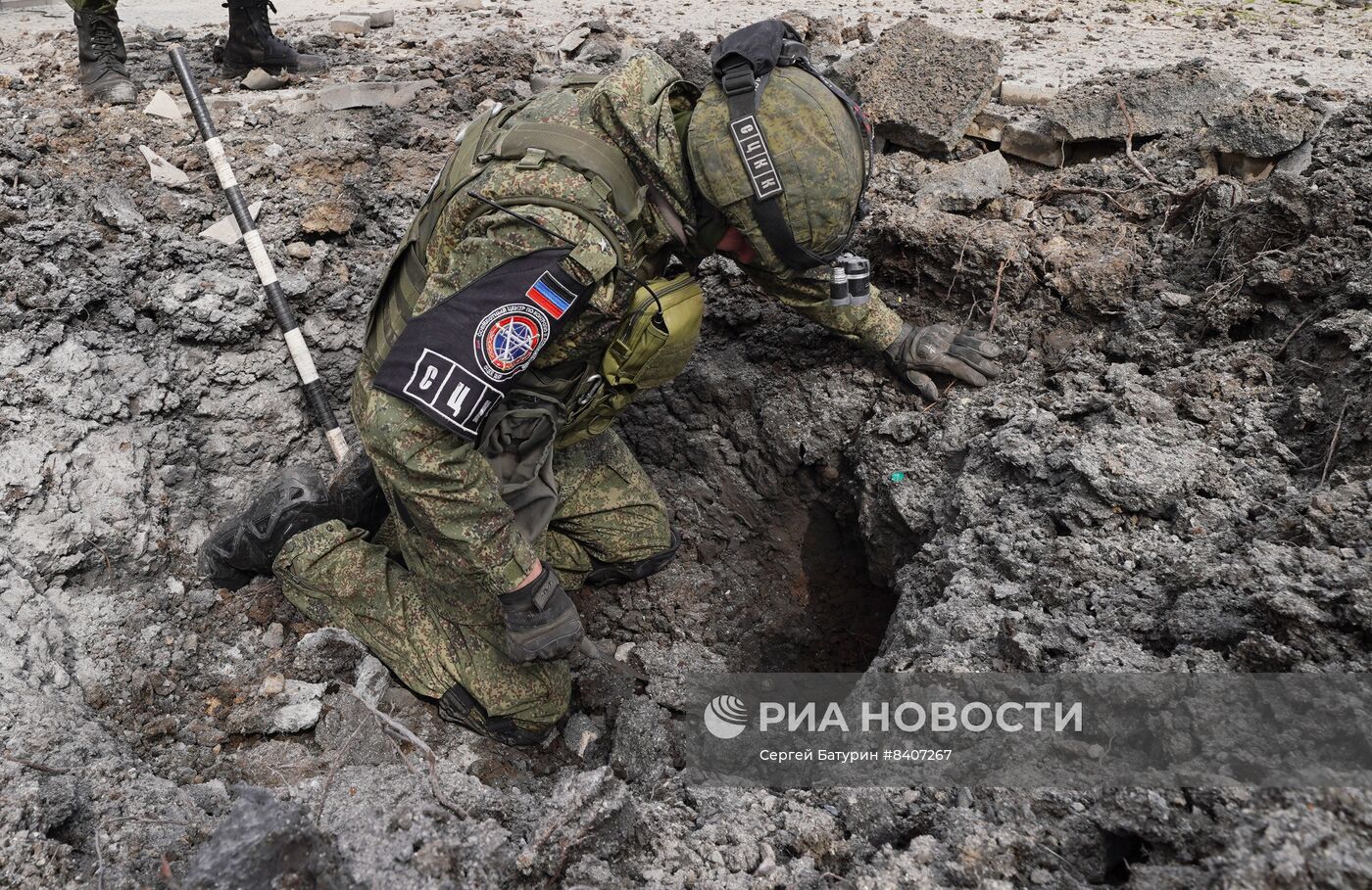 Последствия обстрела рынка в Донецке