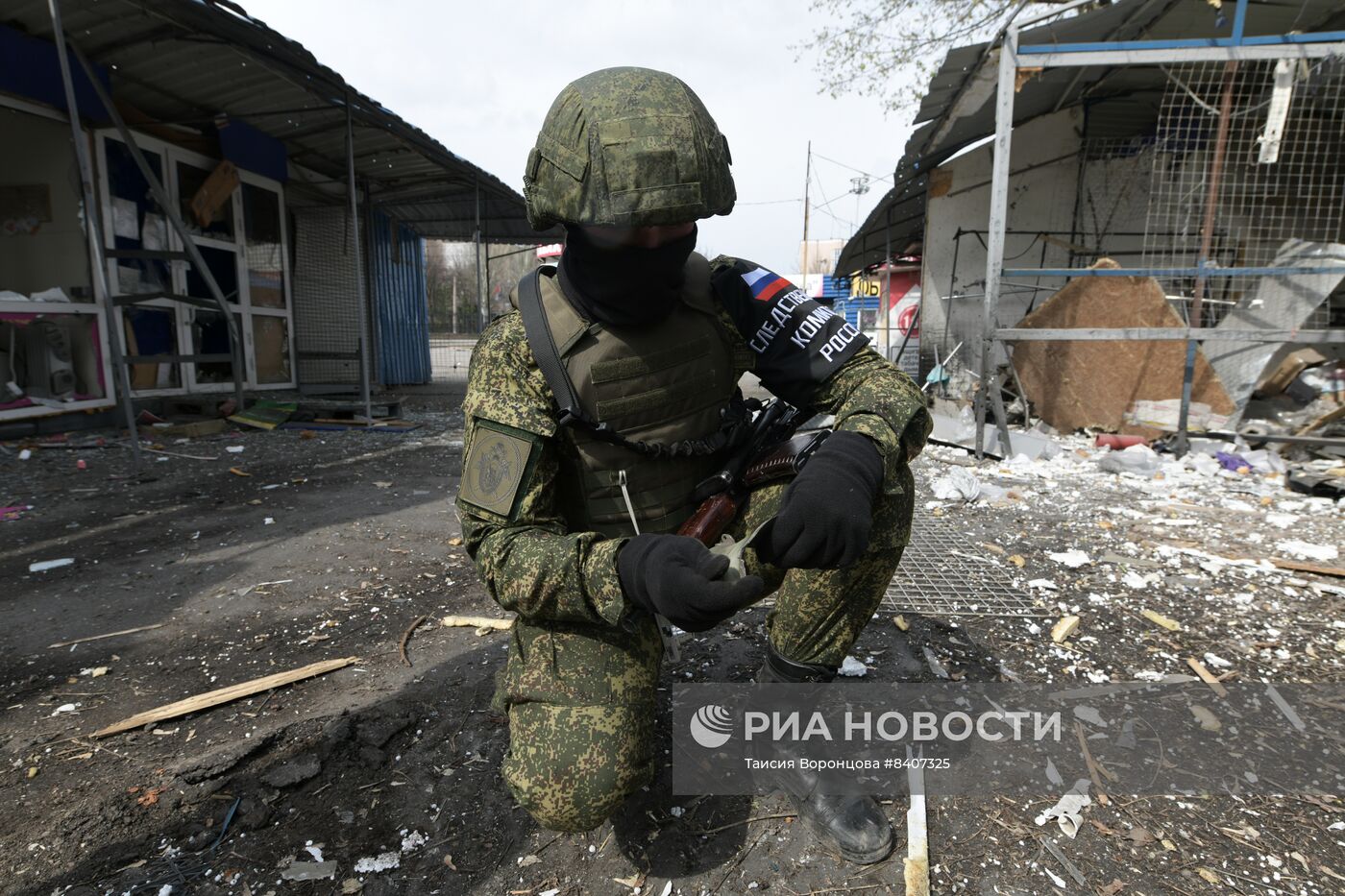Последствия обстрела рынка в Донецке