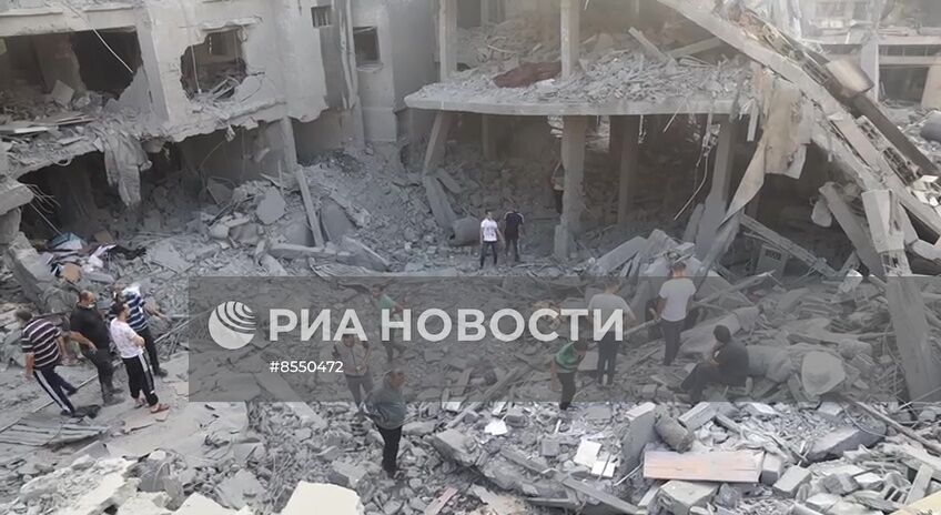 Последствия удара Израиля по жилому дому в Газе