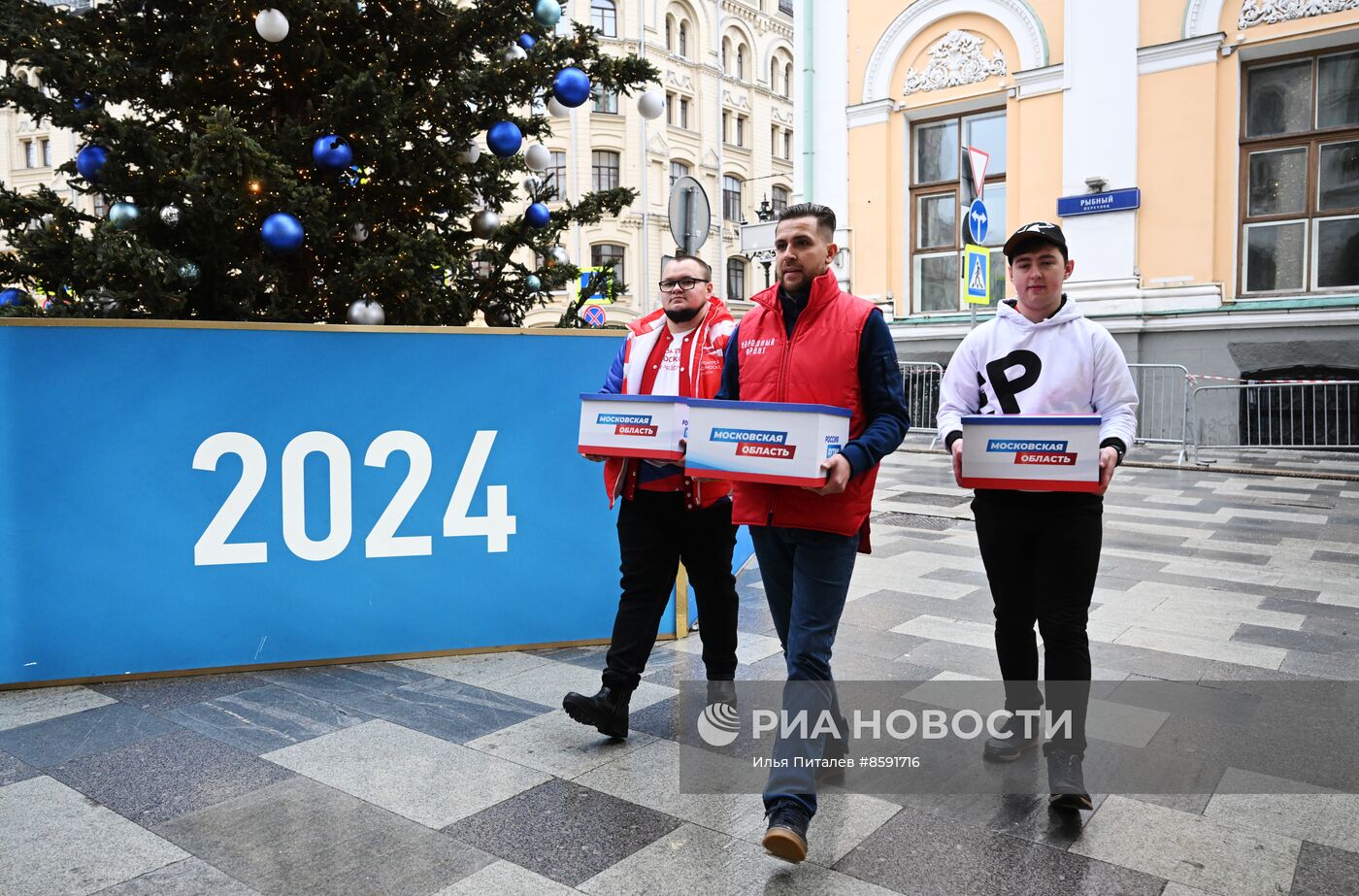 В предвыборный штаб Владимира Путина привезли первую партию подписей в поддержку кандидата