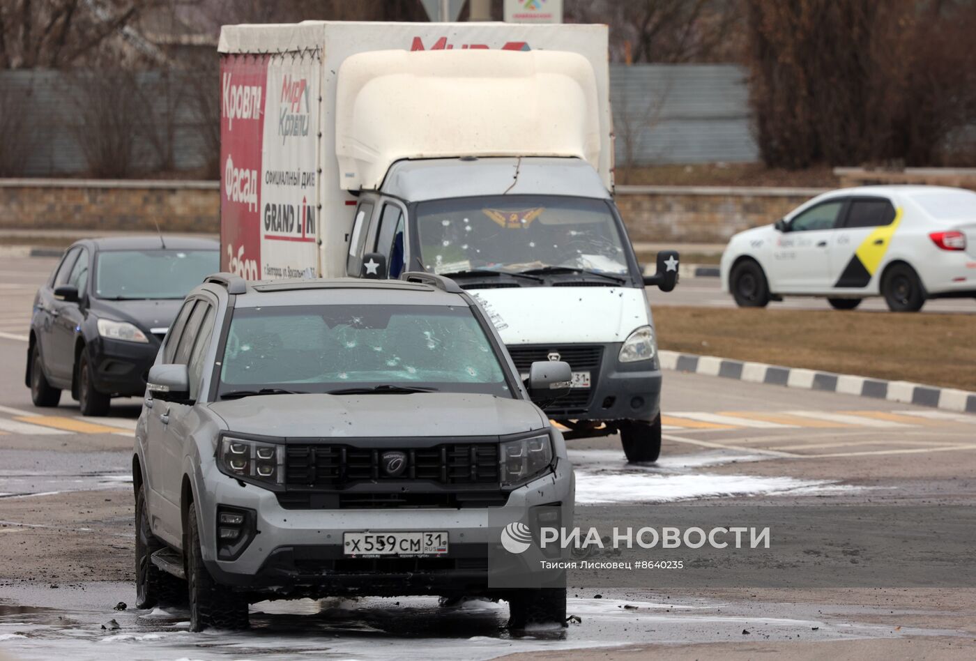 Последствия атаки беспилотника в Белгороде