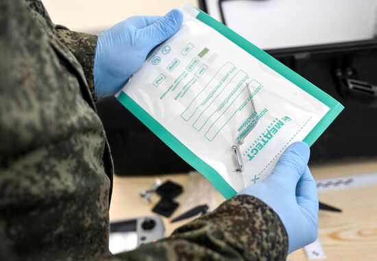 Работа экспертов-криминалистов СУ СК в Запорожской области