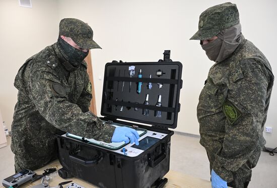 Работа экспертов-криминалистов СУ СК в Запорожской области