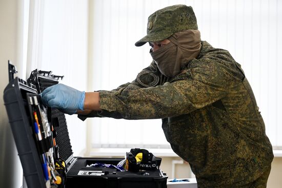 Работа экспертов-криминалистов СУ СК в Запорожской области