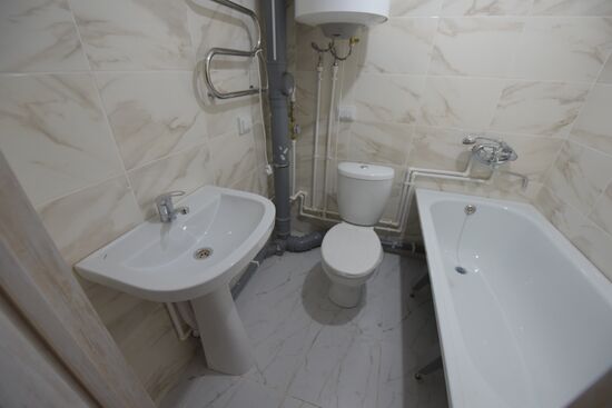 Сдача в эксплуатацию первого восстановленного дома в Авдеевке