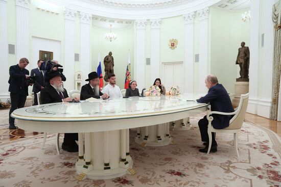 Президент Владимир Путин встретился с Александром и Еленой Труфановыми и Сапир Коэн