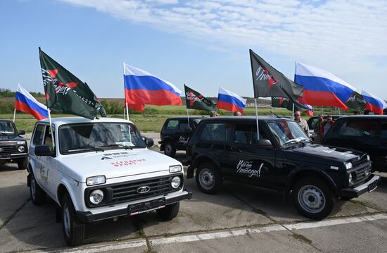 Передача автомобилей и техники для бойцов СВО