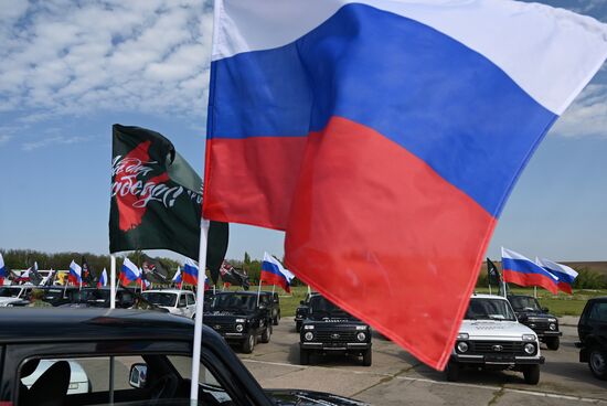 Передача автомобилей и техники для бойцов СВО