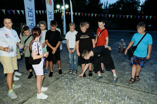 Акция в Бердянске ко Дню памяти детей - жертв войны на Донбассе