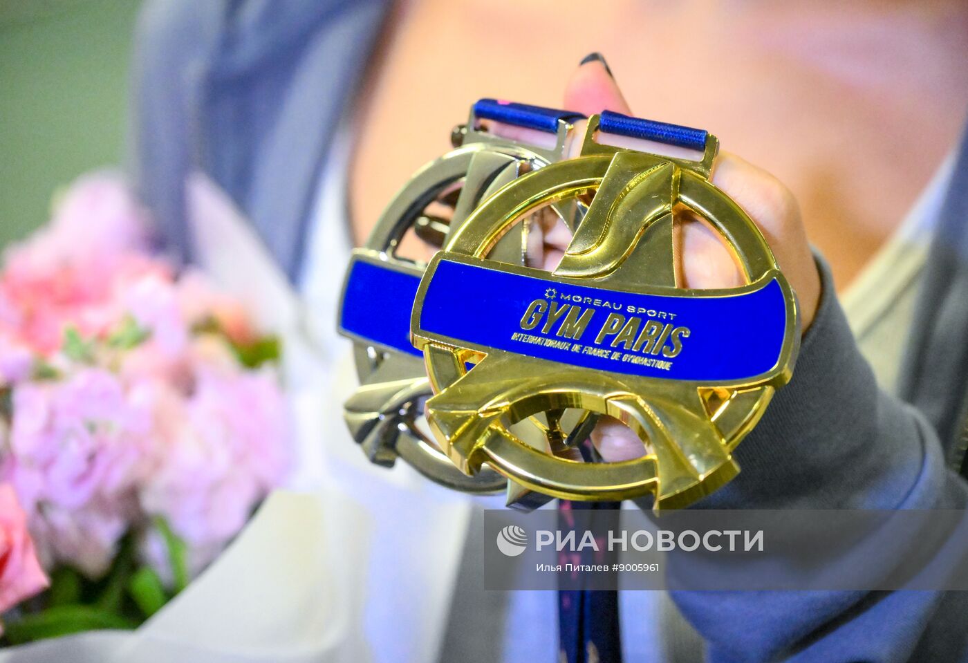 Встреча гимнастки А. Мельниковой, завоевавшей золото на международном турнире